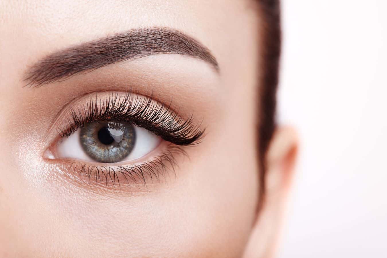 closeup of a woman's eye and her lashes